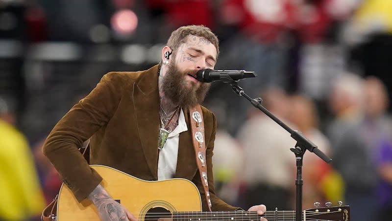 Post Malone performs "America the Beautiful" during the first half of the NFL Super Bowl 58 football game Sunday, Feb. 11, 2024, in Las Vegas. A country music album from the artist appears to be on the horizon.