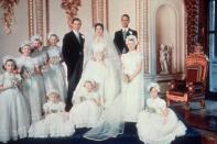 <p>Princess Margaret, her new husband Antony Armstrong-Jones, and her bridesmaids pose for photos in the palace following their wedding ceremony. </p>