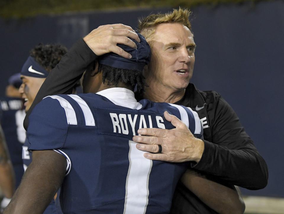 Utah State coach Blake Anderson hugs wide receiver Jalen Royals (1) after the team’s win over Colorado State in an NCAA college football game Saturday, Oct. 7, 2023, in Logan, Utah. | Eli Lucero/The Herald Journal via AP