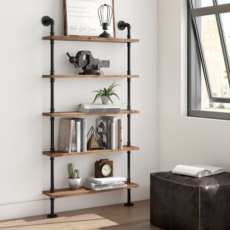 <a href="https://fave.co/2KF9VLm" target="_blank" rel="noopener noreferrer">Wayfair</a> is known for its wide variety of affordable, everyday furniture and decor. You&rsquo;ll find plenty of industrial furniture, such as this <a href="https://fave.co/32hJDX9" target="_blank" rel="noopener noreferrer">pipe bookcase</a> and this <a href="https://fave.co/3ijXEsC" target="_blank" rel="noopener noreferrer">loose lightbulb chandelier</a>. <a href="https://fave.co/2KF9VLm" target="_blank" rel="noopener noreferrer">Browse more industrial decor from Wayfair</a>.