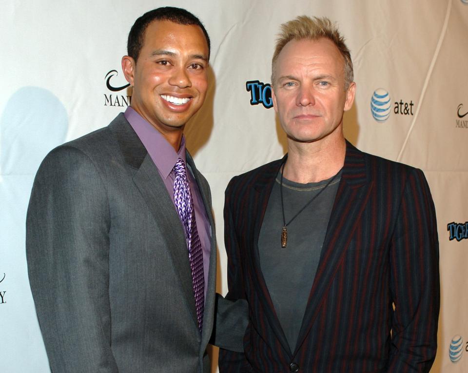 Tiger Woods and Sting during Tiger Jam IX Benefit Concert - Arrivals at House of Blues in Las Vegas, Nevada, United States. (Photo by L. Cohen/WireImage)