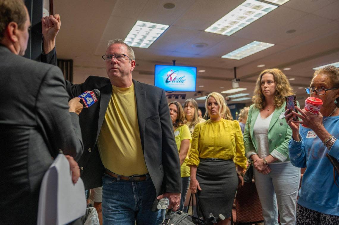 Brian Connell was surrounded by supporters after a meeting Tuesday where fellow Olathe school board members voted to censure him.