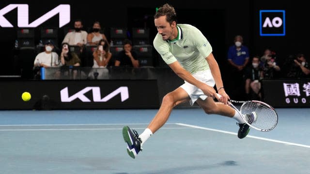 Daniil Medvedev sprints into a backhand