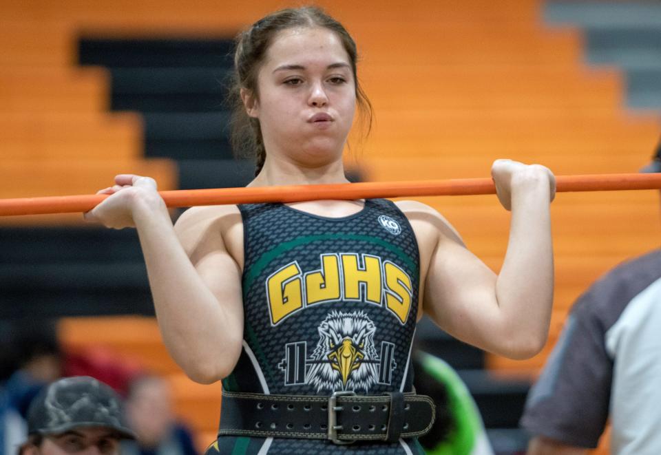 George Jenkins senior Dallas Dickey pauses during the clean-and-jerk. She won the 183-pound division on Saturday at the 2022 Polk County Girls Weightlifting Meet at Lake Wales High School.