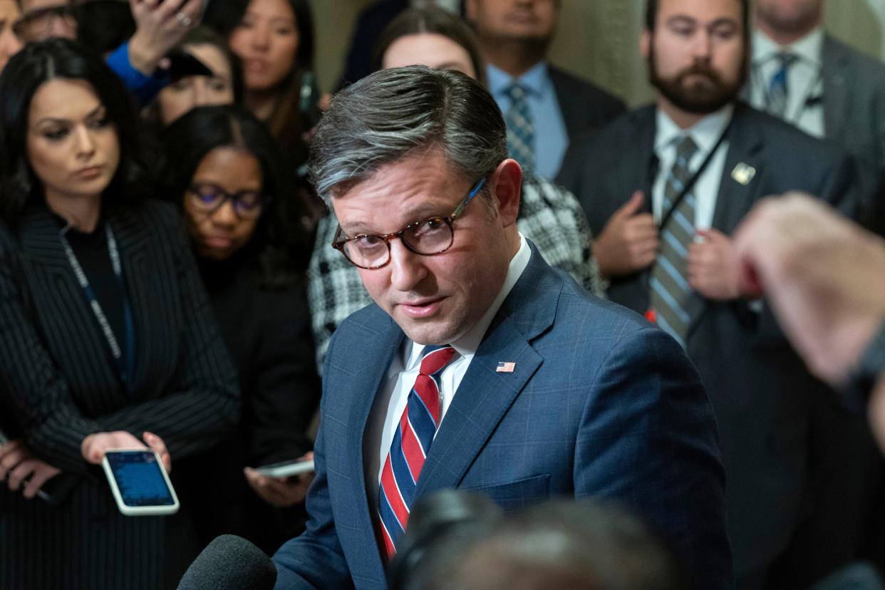 Speaker of the House Rep. Mike Johnson, R-La., talks to reporters after a meeting with Ukrainian President Volodymyr Zelenskyy in the U.S. Capitol, Tuesday, Dec. 12, 2023, in Washington.