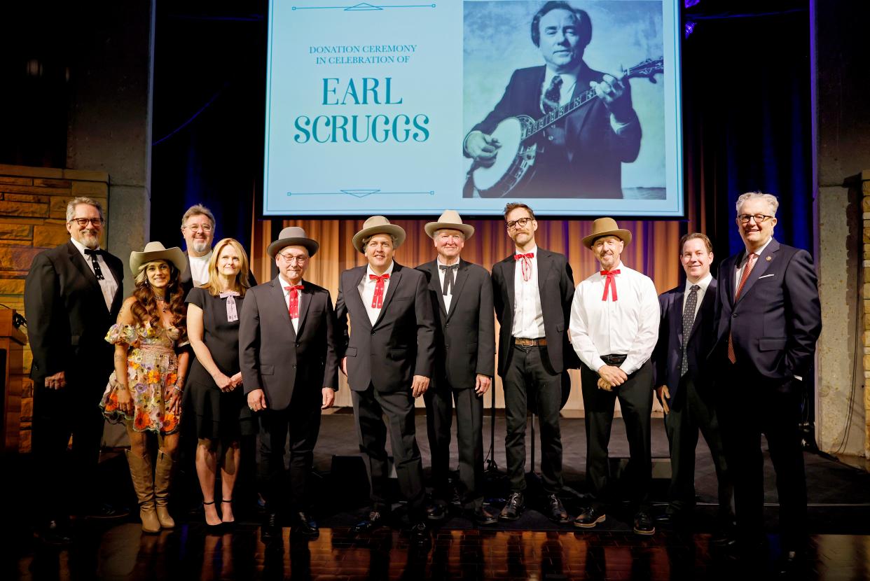 Jerry Douglas, Sierra Ferrell, Vince Gill, Alison Brown, Charlie Cushman, Shawn Camp,  Jeff White, Daniel Kimbro, Johnny Warren, VP of Museum Services at Country Music Hall of Fame and Museum Michael Gray and CEO of Country Music Hall of Fame and Museum Kyle Young attend the celebration of the donation of Earl Scruggs's Gibson RB-Granada Mastertone Banjo to the Country Music Hall of Fame and Museum's permanent collection on May 22, 2023 in Nashville, Tennessee.