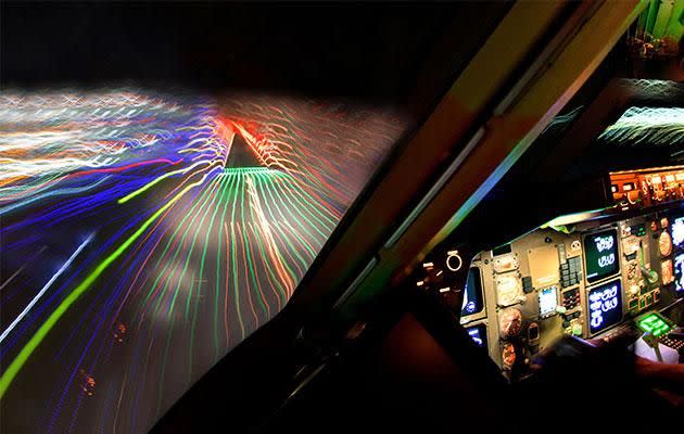 A bright and vivid show of Northern Lights from the cockpit. Photo: Caters