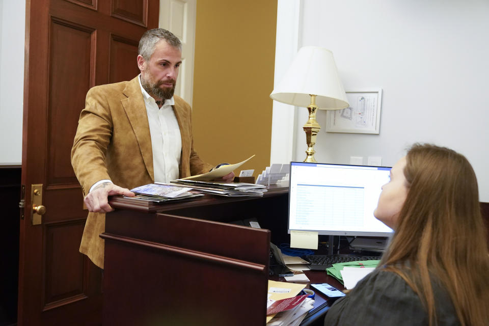 Former Washington Metropolitan Police Department officer Michael Fanone arrives to hand deliver a letter to Rep. Marjorie Taylor Greene's office as the House meets for a second day to elect a speaker and convene the 118th Congress in Washington, Wednesday, Jan. 4, 2023. (AP Photo/Jacquelyn Martin)