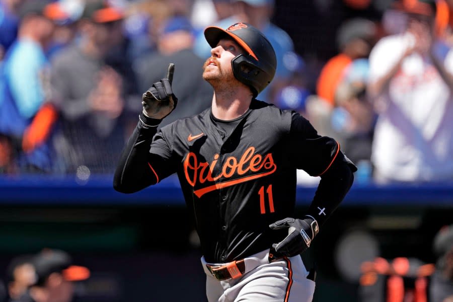 Baltimore Orioles’ Jordan Westburg celebrates as he crosses the plate after hitting a solo home run during the third inning of a baseball game against the Kansas City Royals Sunday, April 21, 2024, in Kansas City, Mo. (AP Photo/Charlie Riedel)