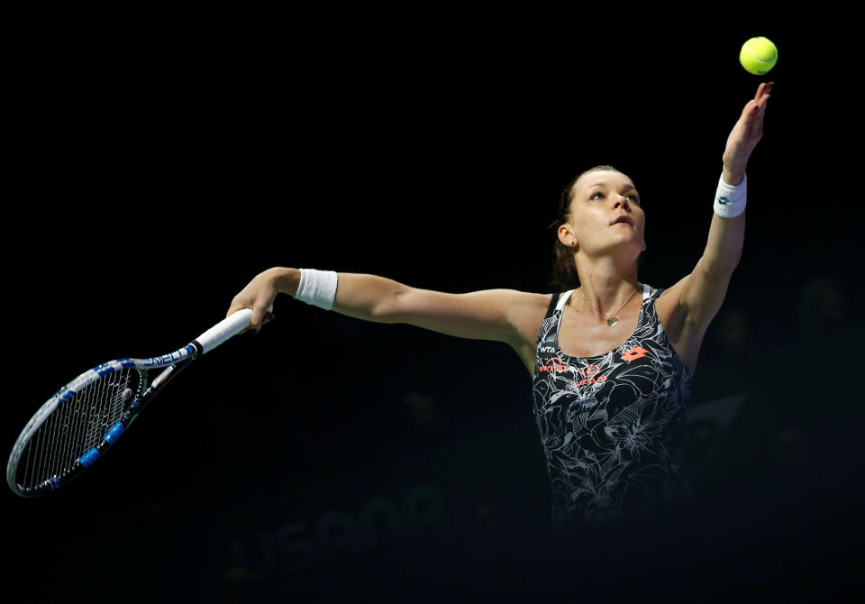 Agnieszka Radwanska serves during a match in Singapore