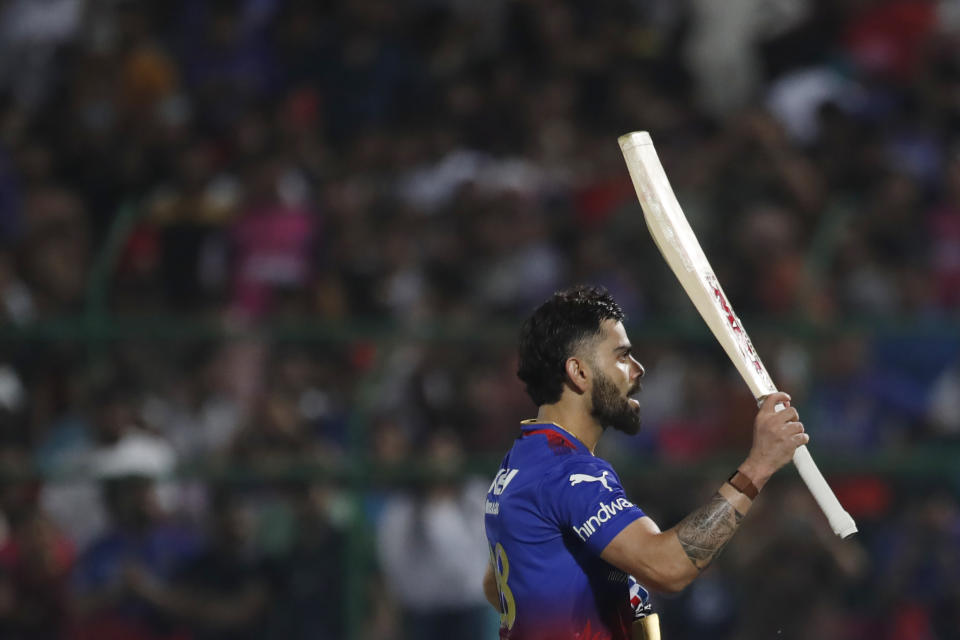 Royal Challengers Bengaluru's Virat Kohli celebrates scoring a century during the Indian Premier League cricket match between Rajasthan Royals and Royal Challengers Bangaluru in Jaipur, India, Saturday, April 6, 2024. (AP Photo/Pankaj Nangia)