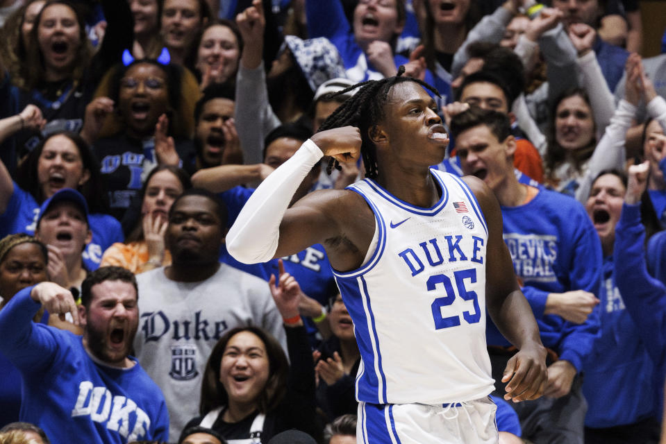 Duke's Mark Mitchell (25) celebrates after a play during the first half of an NCAA college basketball game against Syracuse in Durham, N.C., Tuesday, Jan. 2, 2024. (AP Photo/Ben McKeown)