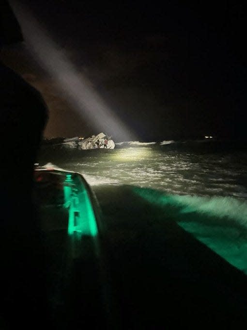 The Coast Guard rescued a man Thursday night from a sailboat which had run aground, was taking on water and was in danger of capsizing near Ponce Inlet.