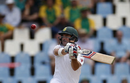 South Africa's Dean Elgar plays a shot during the fourth cricket test match against England at Centurion, South Africa, January 22, 2016. REUTERS/Siphiwe Sibeko