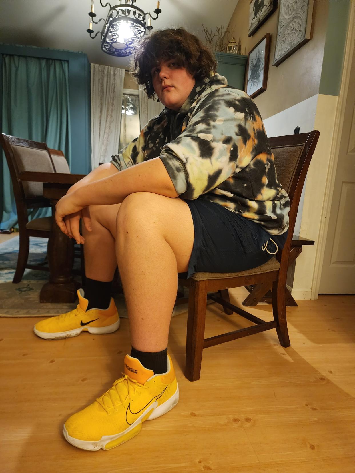 Eric Kilburn, 14, in his size 22 Nike shoes. The 6'10