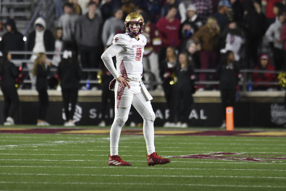 Boston College quarterback Phil Jurkovec walks off the field after a receiver fumbled the ball during the second half of the team's NCAA college football game against Clemson on Saturday, Oct. 8, 2022, in Boston. (AP Photo/Mark Stockwell)