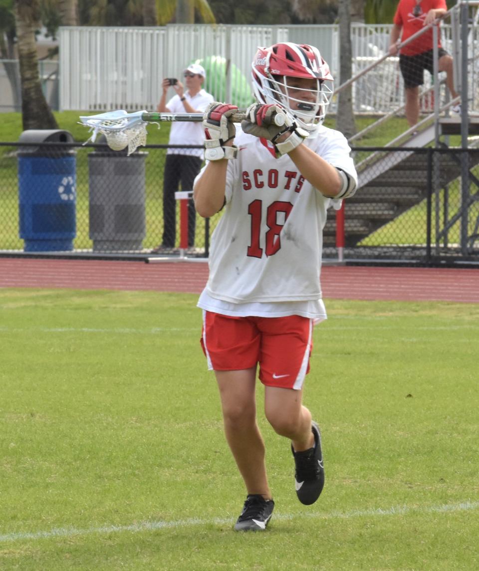 St. Andrew's Jackson Corlew looks to pass the ball in the second half of the Scots' district semifinal against Calvary Christian on Thursday.