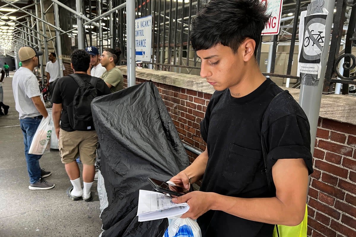 Transporting Migrants NYC Tents (Copyright 2022 The Associated Press. All rights reserved.)