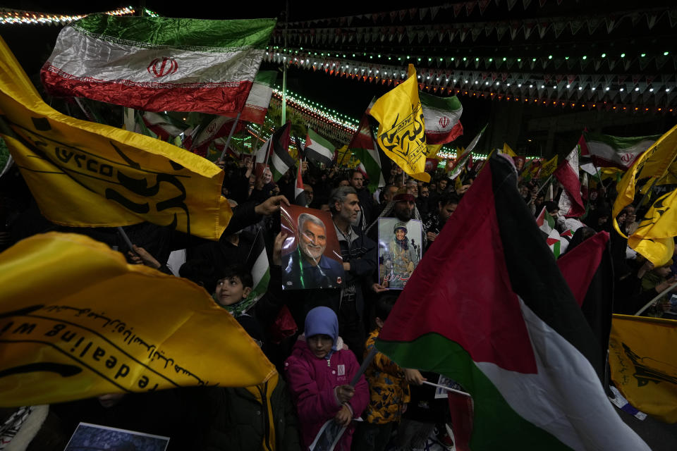 Iranian protesters attend an anti-Israeli gathering to condemn killing members of the Iranian Revolutionary Guard in Syria, at the Felestin (Palestine) Sq. in downtown Tehran, Iran, Monday, April 1, 2024. An Israeli airstrike that demolished Iran's consulate in Syria killed two Iranian generals and five officers, Syrian and Iranian officials said Monday. (AP Photo/Vahid Salemi)