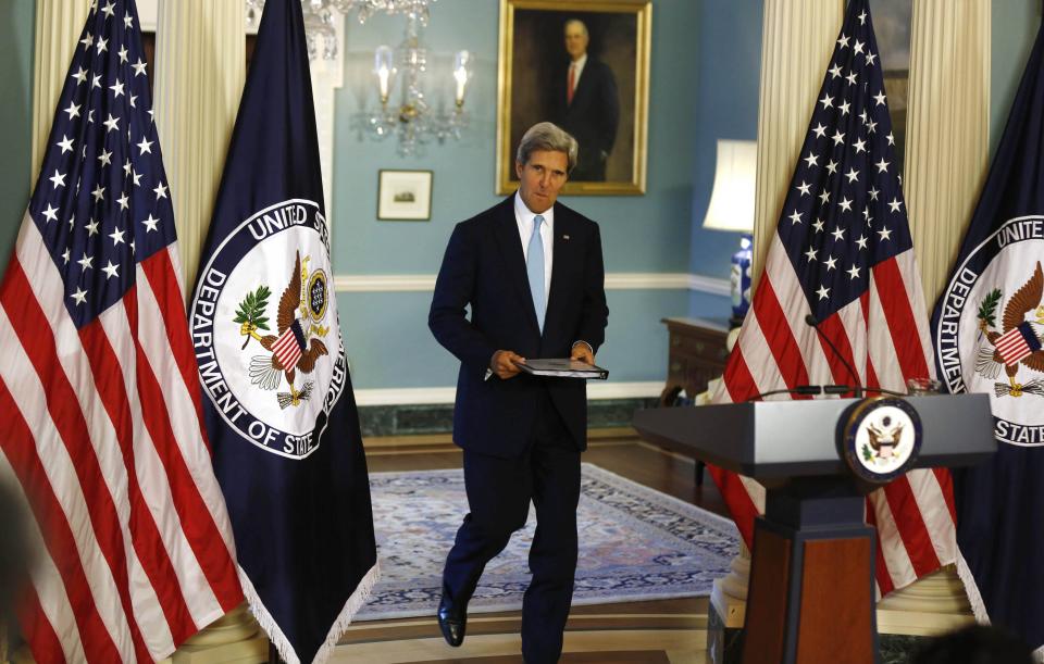 U.S. Secretary of State John Kerry arrives to speak about the ongoing situation in Syria at the State Department in Washington, August 30, 2013. Kerry on Friday made a broad case for limited U.S. military action against Syria for its suspected use of chemical weapons, saying it could not go unpunished for such a "crime against humanity." REUTERS/Larry Downing (UNITED STATES - Tags: POLITICS MILITARY CONFLICT)