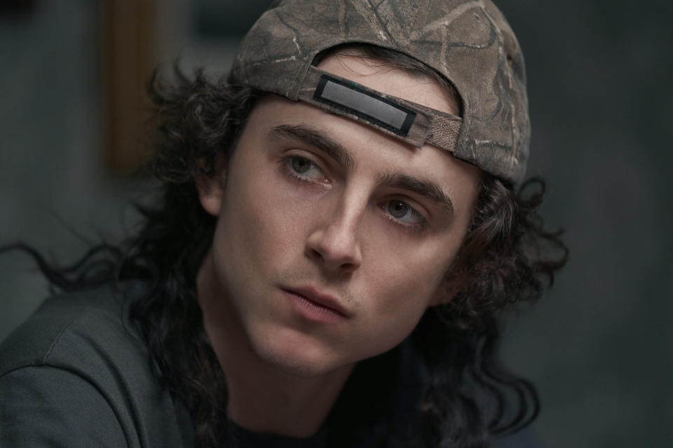 This image released by Netflix shows Timothee Chalamet as Yule in a scene from "Don't Look Up." (Niko Tavernise/Netflix via AP)
