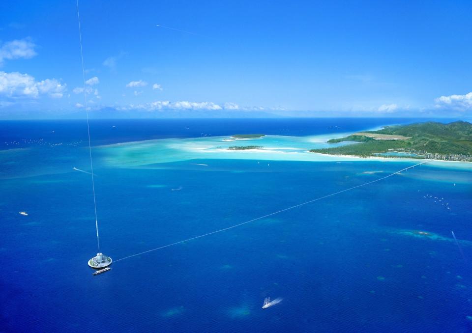 A circular object floats in a body of water offshore