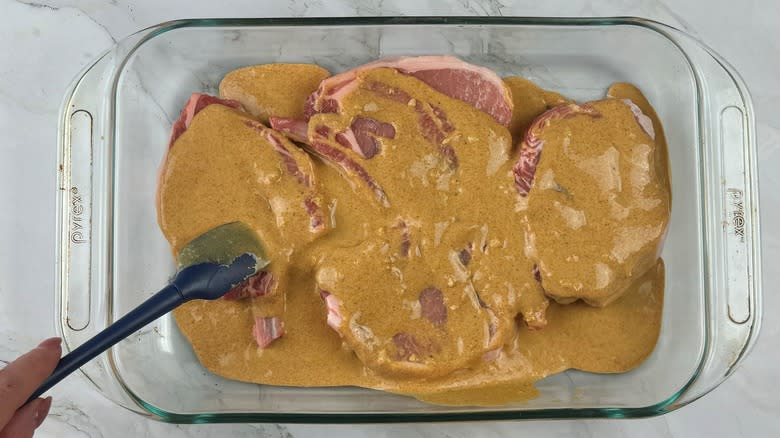 coating pork chops with marinade
