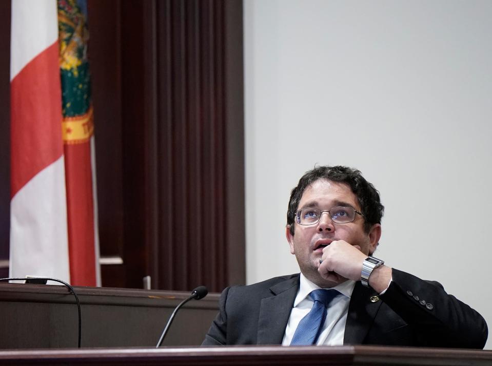 Christopher Moore's former defense attorney, Michael Morrison, testifies before Circuit Judge Kathryn Weston at the S. James Foxman Justice Center in Daytona Beach, Monday, Feb. 26, 2024.