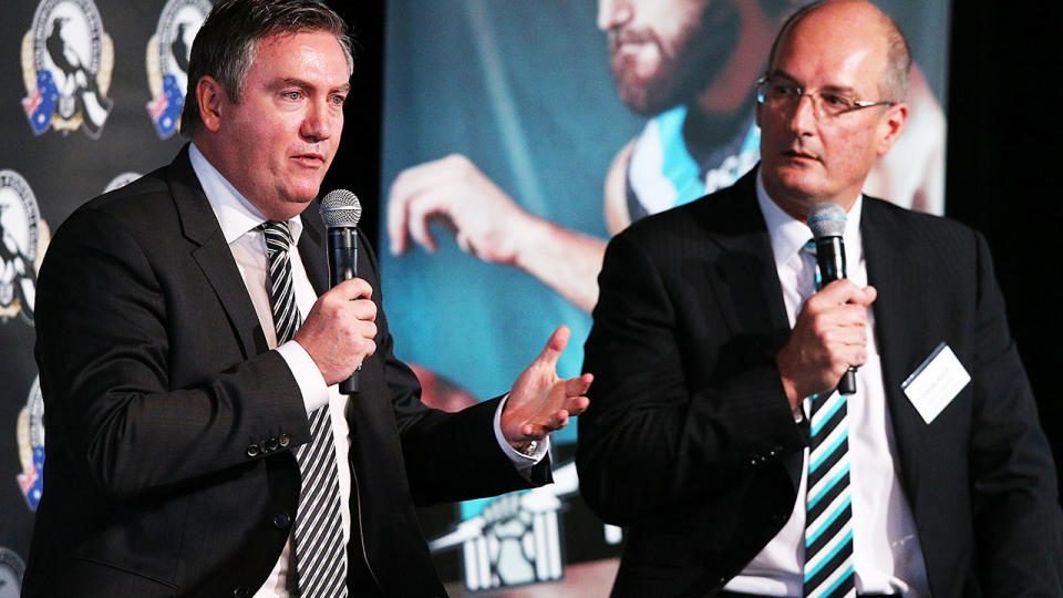 Eddie McGuire and David Koch, pictured here at the MCG in 2014.