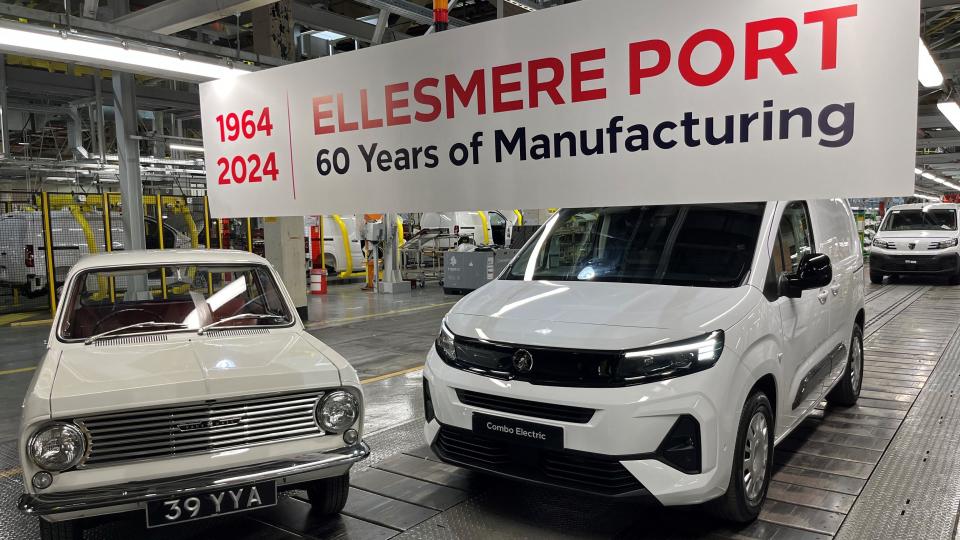 The Vauxhall Viva (left) with one of the electric vans (right) 