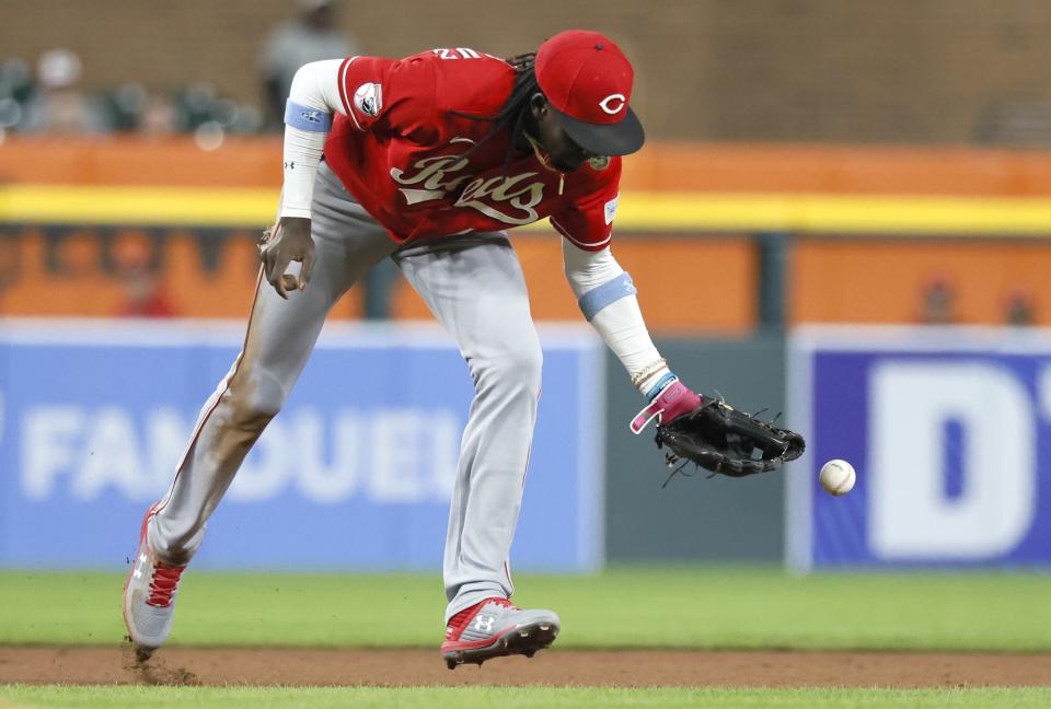 Cincinnati Reds shortstop Elly De La Cruz misplays a grounder hit by Detroit Tigers' Andy Ibanez, who singled during the seventh inning of a baseball game Wednesday, Sept. 13, 2023, in Detroit. (AP Photo/Duane Burleson)