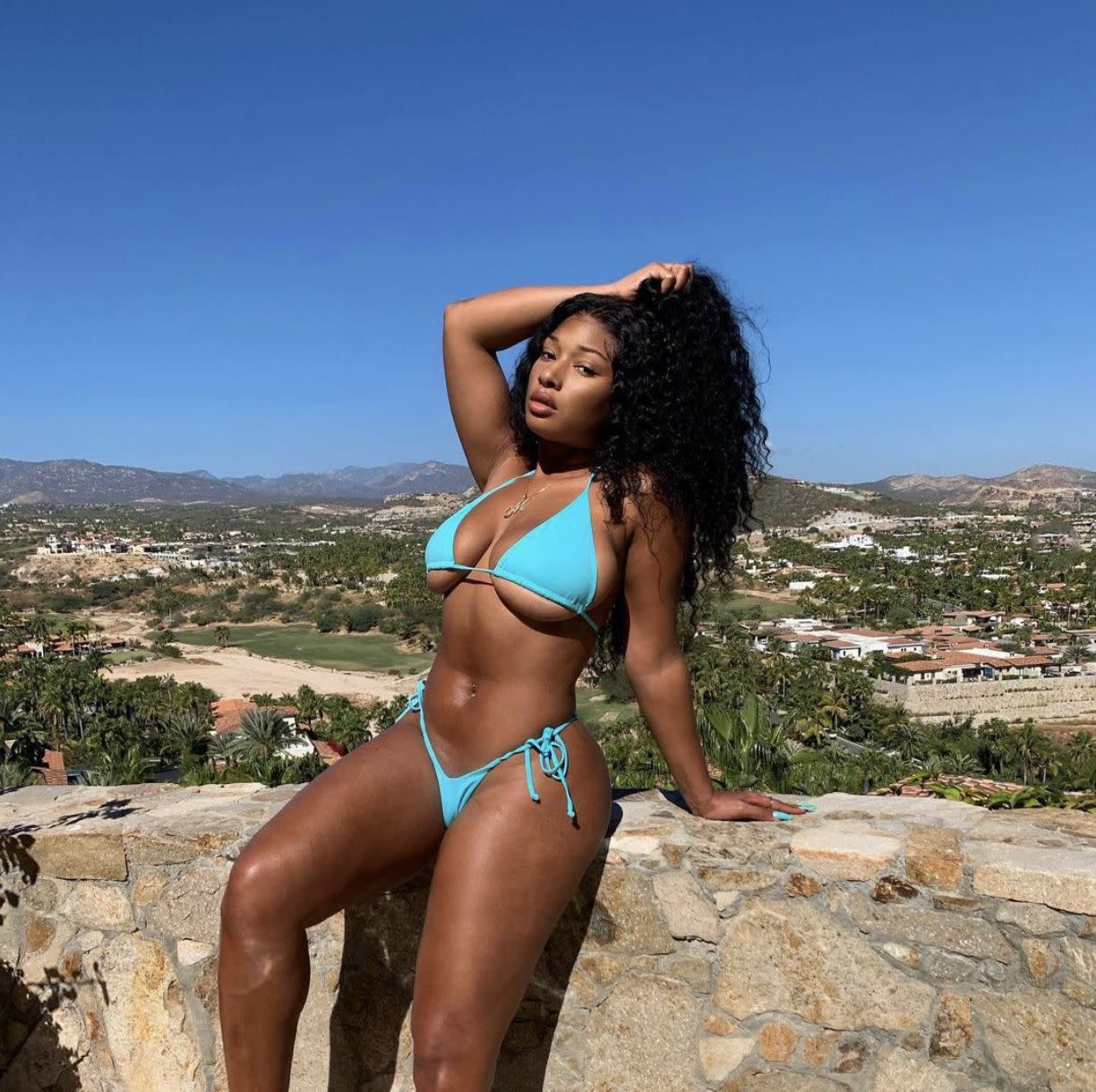 "Body" rapper Megan Thee Stallion, 25, shows off her "BODY ODY" while soaking up the sun on Tuesday, Dec. 29, 2020.