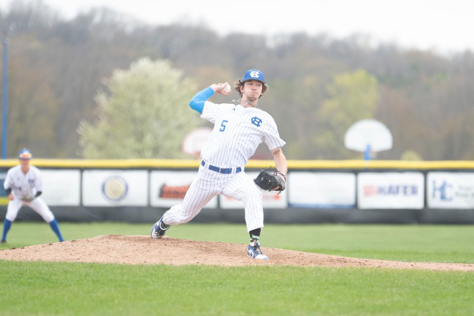 Harper Creek pitcher Tyler Wolfersberger throws a pitch during a game against Jackson Northwest at Harper Creek High School on Tuesday, April 23, 2024.