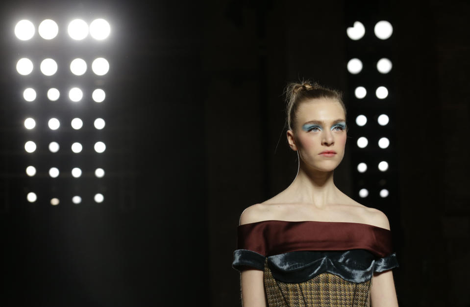 A model wears a creation for Aquilano Rimondi women's Fall-Winter 2013-14 collection, part of the Milan Fashion Week, unveiled in Milan, Italy, Saturday, Feb. 23, 2013. (AP Photo/Luca Bruno)