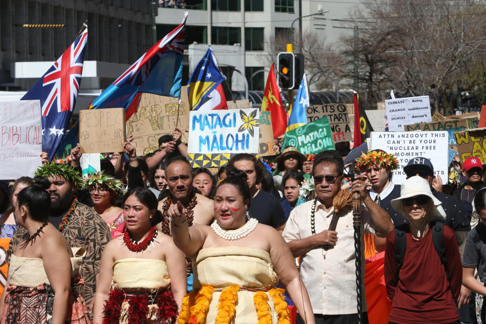 Thousands of people march on Parliament to protest climate change in Wellington, New Zealand, Friday, Sept. 27, 2019. The protest in New Zealand was part of a second wave of protests around the world as the United Nations General Assembly met in New York. (AP Photo/Nick Perry)