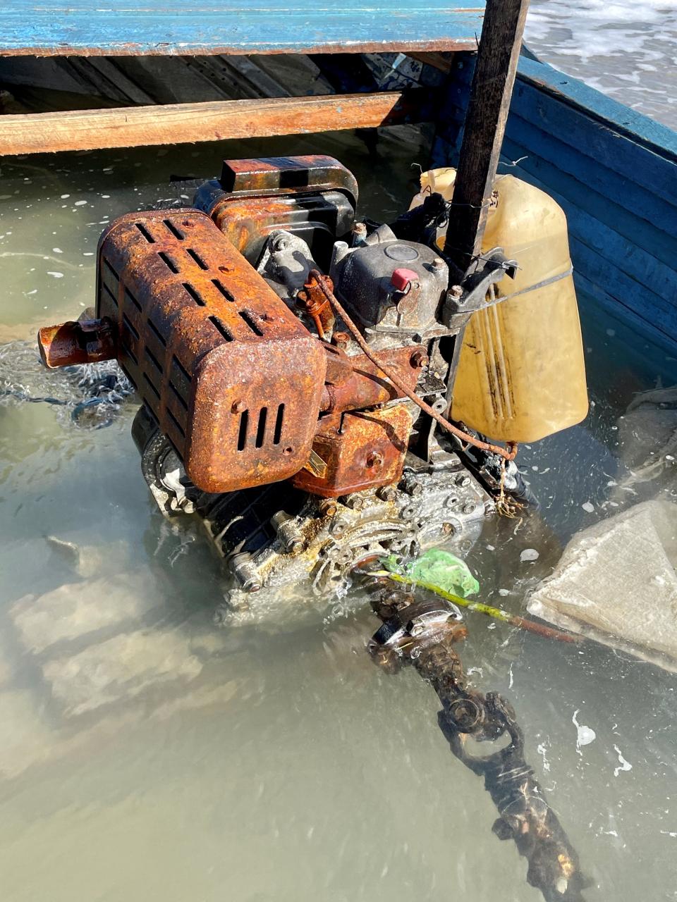 The Melbourne Beach possible migrant vessel had a rusty engine bolted in the middle of its wooden frame.