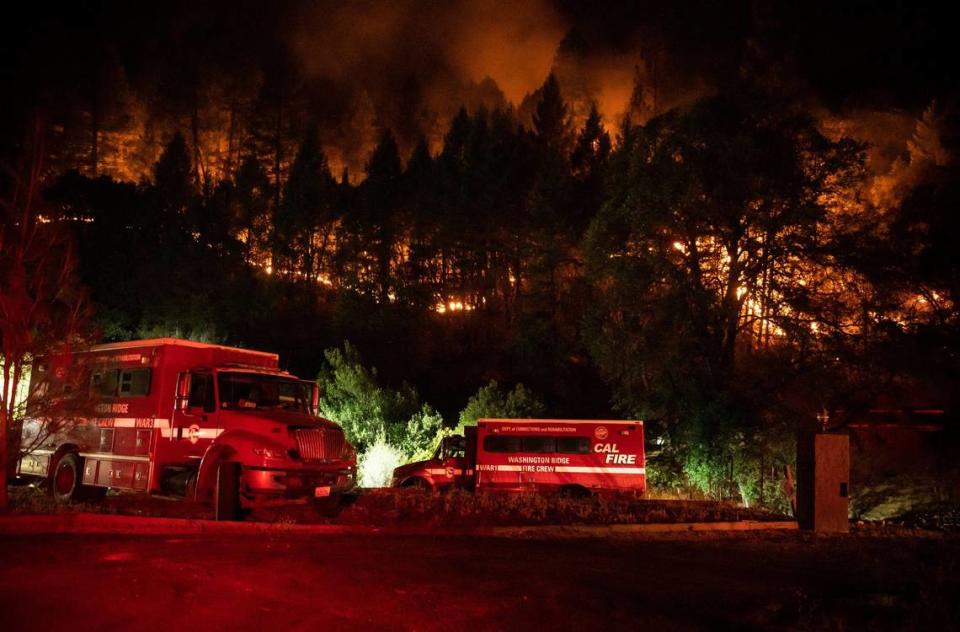 Cal Fire personnel try to contain the River Fire as it burns off Tokayana Way east of Bear River Park and Campground near Colfax on Wednesday, Aug. 4, 2021, in Placer County. After its site crashed in 2020, Cal Fire now has important fire information front and center with its improved website.