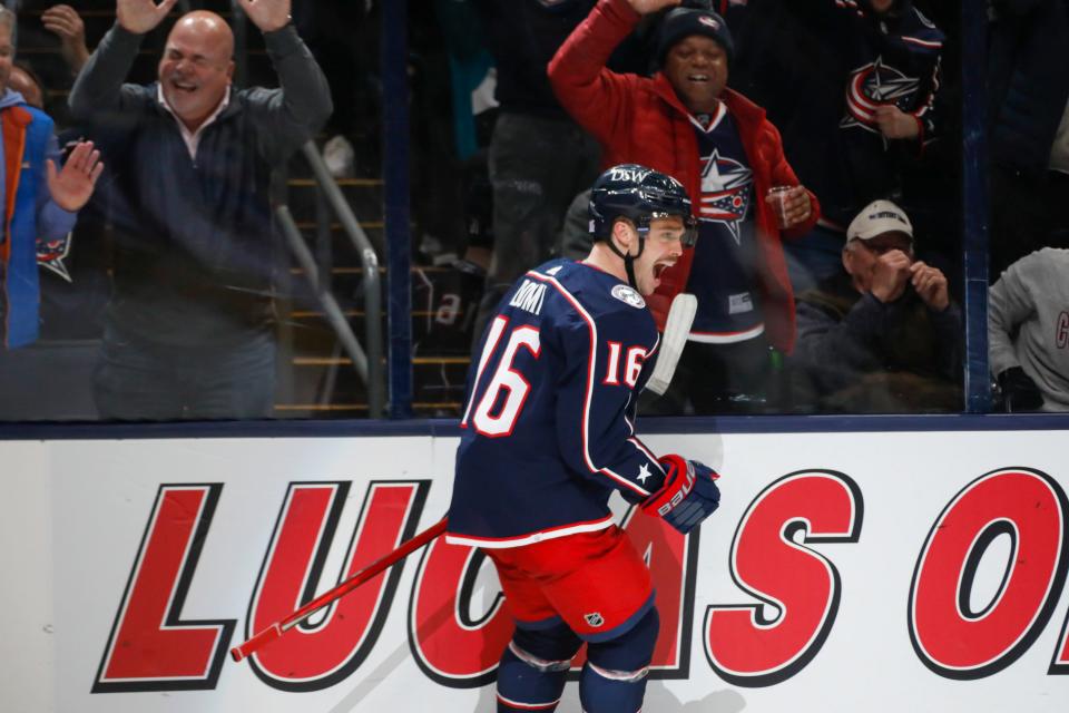 Columbus Blue Jackets center Max Domi (16) celebrates after scoring an empty net goal during the third period of the NHL game at Nationwide Arena in Columbus, Ohio Nov. 26.