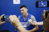 FILE - In this Oct. 11, 2018, file photo, Kentucky's Tyler Herro answers a question during the university's NCAA college basketball media day, in Lexington, Ky. Kentucky is ranked No. 2 in The Associated Press Top 25 preseason poll released Monday, Oct. 22, 2018. (AP Photo/James Crisp, File)