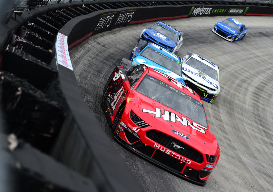 BRISTOL, TN - APRIL 07:  Daniel Suarez, driver of the #41 Haas Automation Ford, leads a pack of cars during the Monster Energy NASCAR Cup Series Food City 500 at Bristol Motor Speedway on April 7, 2019 in Bristol, Tennessee.  (Photo by Jared C. Tilton/Getty Images)
