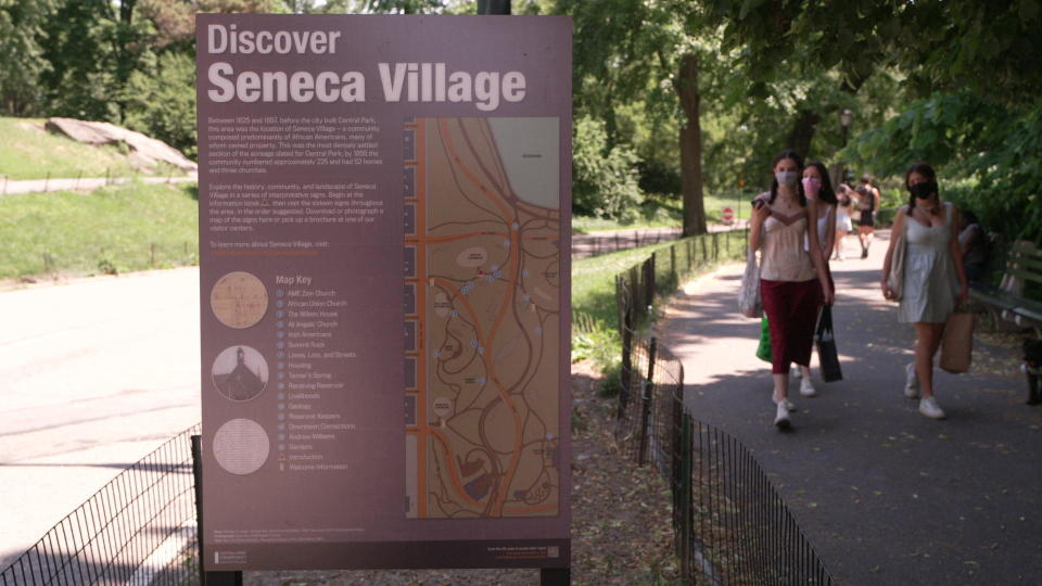 A sign marks the location of Seneca Village in New York's Central Park.  / Credit: CBS News