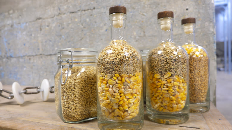 glass bottles filled with grains