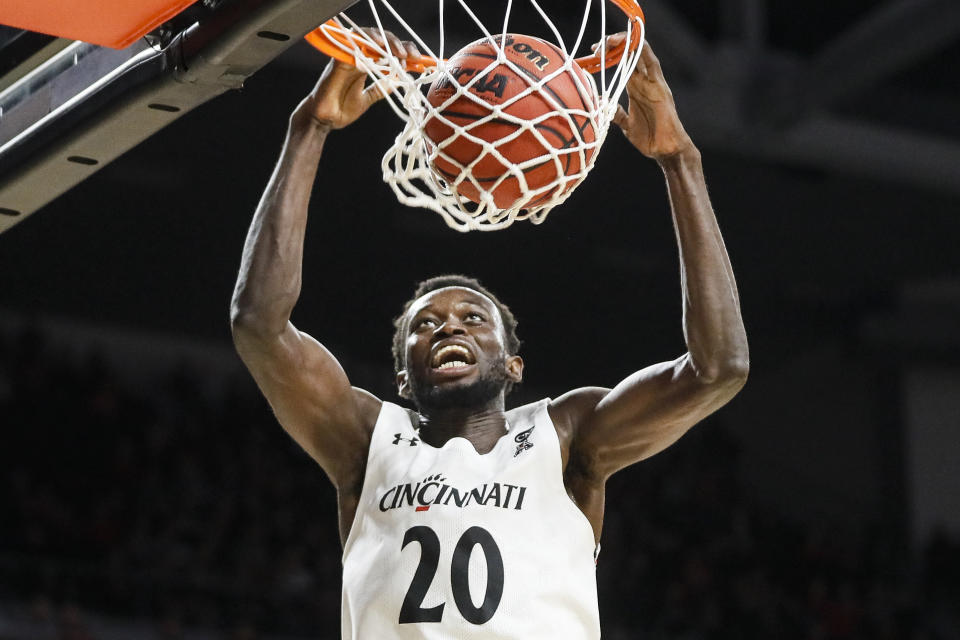 Cincinnati's Mamoudou Diarra dunks during the second half of an NCAA college basketball game against East Carolina, Sunday, Jan. 19, 2020, in Cincinnati. (AP Photo/John Minchillo)