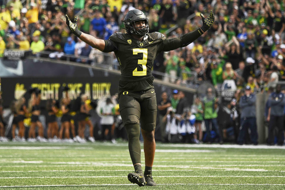 Sep 17, 2022; Eugene, Oregon, USA; Oregon Ducks defensive end Brandon Dorlus (3) celebrates after a defensive stop against the Brigham Young Cougars at Autzen Stadium. Oregon won the game 41-20. Mandatory Credit: Troy Wayrynen-USA TODAY Sports