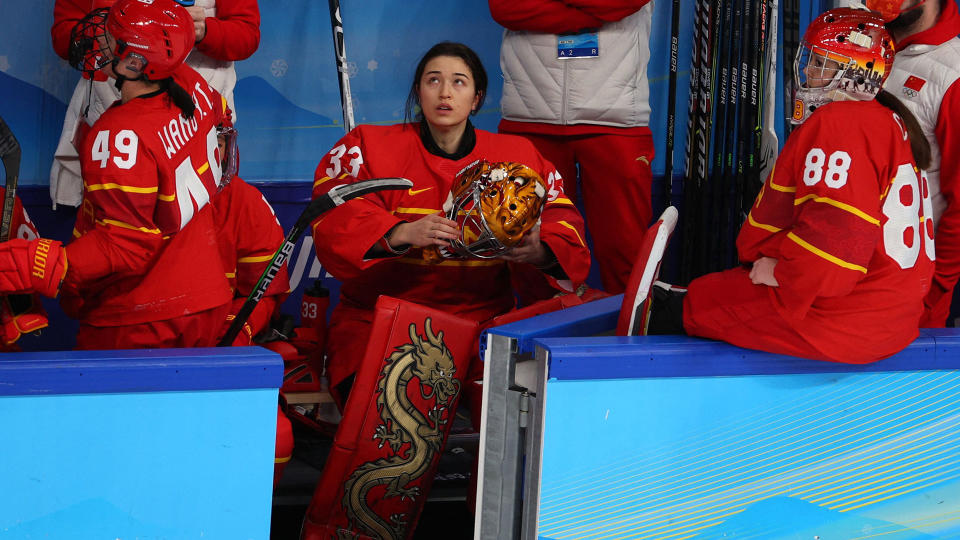 Zhou Jiaying, centre, was not allowed to speak English during an Olympic media availability. (REUTERS/Brian Snyder)