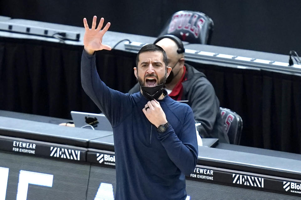 Charlotte Hornets head coach James Borrego yells at his team during the first half of an NBA basketball game against the Chicago Bulls, Thursday, April 22, 2021, in Chicago. (AP Photo/Charles Rex Arbogast)