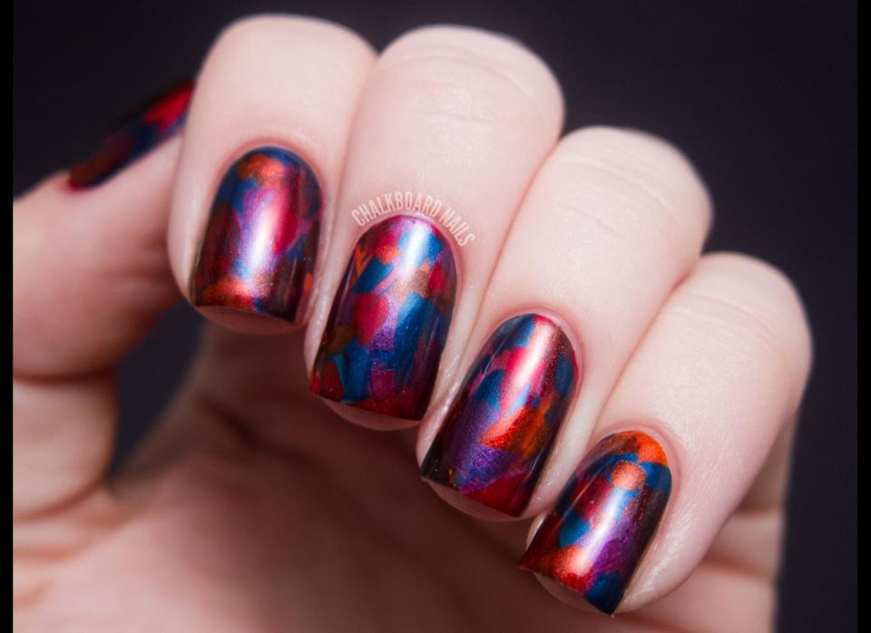 "This manicure is easy to do but very eye catching! It simply involves using the brush that comes with the polish to paint on random, jagged strokes, creating a fractured effect. For this look, I've used five of the new OPI Germany Collection shades." -Sarah of <a href="http://www.chalkboardnails.com/" target="_hplink">Chalkboard Nails</a>