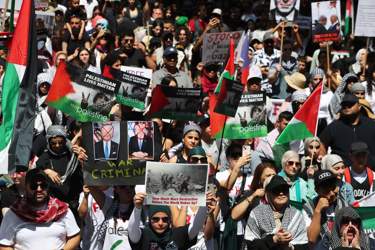 Palestine supporters gather during a protest at Town Hall on Saturday in Sydney, Australia (Getty Images)