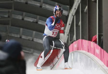 Feb 11, 2018; Pyeongchang, South Korea; Chris Mazdzer (USA) celebrates after the fourth run of the men's single luge in the Pyeongchang 2018 Olympic Winter Games at Olympic Sliding Centre. Eric Seals-USA TODAY Sports