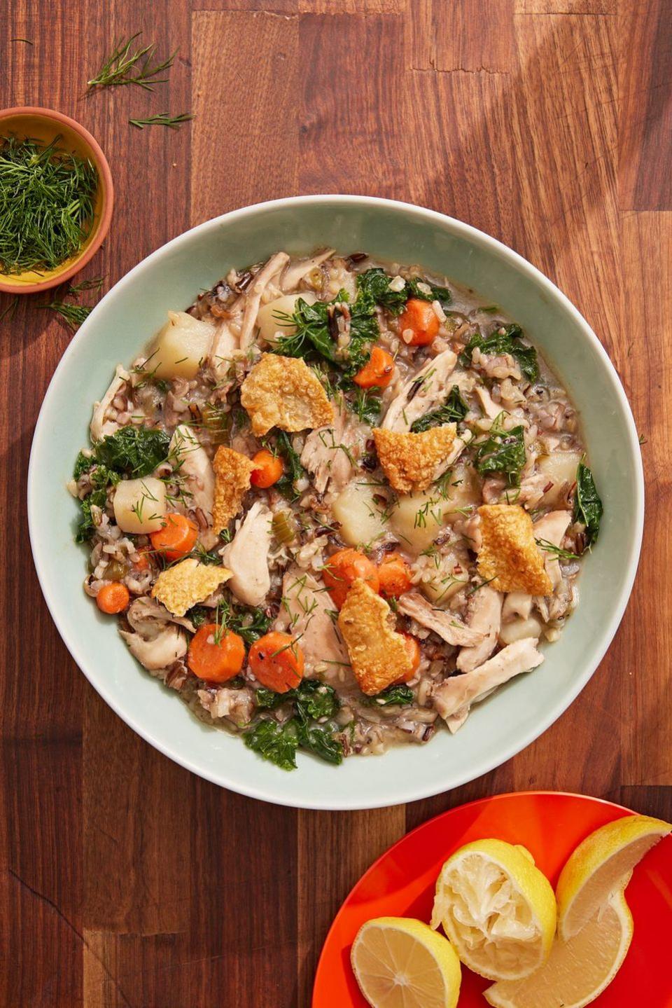 <p>This comforting bowl is sort of like an earthy version of <a href="https://www.delish.com/cooking/recipe-ideas/recipes/a51338/homemade-chicken-noodle-soup-recipe/" rel="nofollow noopener" target="_blank" data-ylk="slk:chicken noodle soup;elm:context_link;itc:0;sec:content-canvas" class="link ">chicken noodle soup</a>. Wild rice brings some subtle floral, smoky flavors, while bone-in <a href="https://www.delish.com/cooking/g2133/chicken-thighs/" rel="nofollow noopener" target="_blank" data-ylk="slk:chicken thighs;elm:context_link;itc:0;sec:content-canvas" class="link ">chicken thighs</a> provide enough fat and flavor for a rich homemade stock. Topped with crispy chicken skin "croutons," we dare you to find a meal that can ward off the blustery cold like this one.<br><br>Get the <strong><a href="https://www.delish.com/cooking/a37636336/chicken-wild-rice-soup-recipe/" rel="nofollow noopener" target="_blank" data-ylk="slk:Chicken & Wild Rice Soup recipe;elm:context_link;itc:0;sec:content-canvas" class="link ">Chicken & Wild Rice Soup recipe</a></strong>.</p>